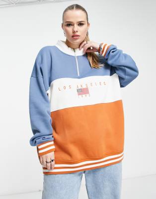 Daisy Street Plus half zip funnel neck sweat in colour block with LA graphic