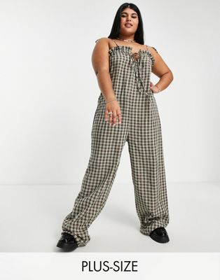 Daisy Street Plus relaxed jumpsuit in grunge check print with tie front and straps