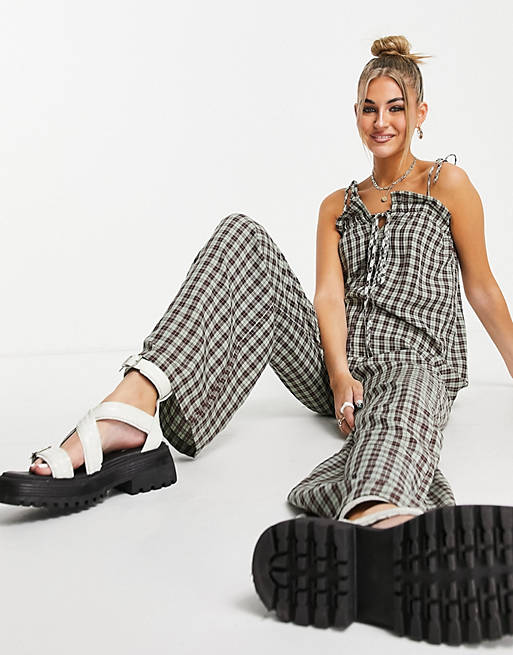 Daisy Street relaxed jumpsuit in grunge check print with tie front and straps