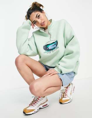 Daisy Street relaxed oversized boyfriend half zip sweatshirt with national park graphic in light green