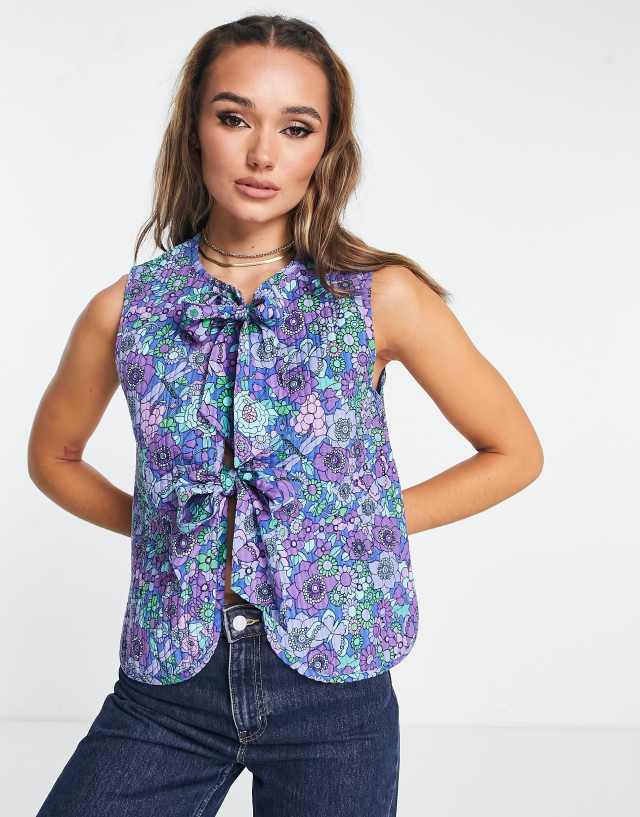 Damson Madder cotton quilted vest in blue floral