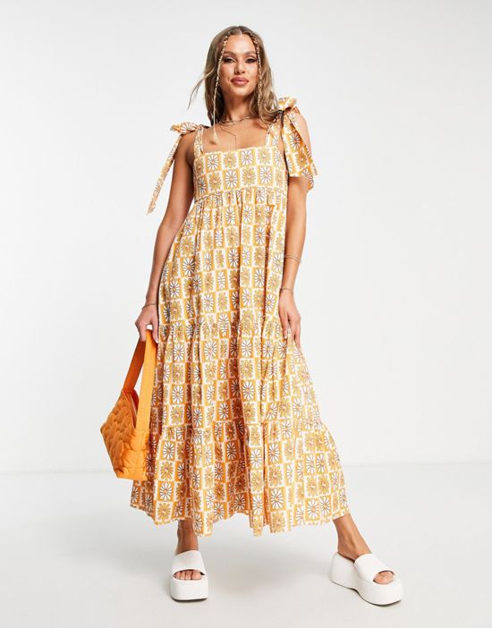 https://images.asos-media.com/products/damson-madder-hettie-maxi-beach-summer-dress-in-groovy-daisy/203054563-2?$n_550w$&wid=550&fit=constrain