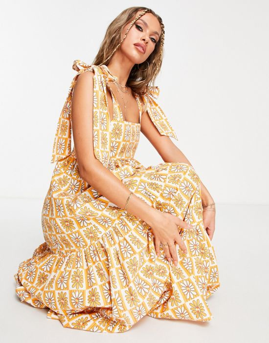 https://images.asos-media.com/products/damson-madder-hettie-maxi-beach-summer-dress-in-groovy-daisy/203054563-3?$n_550w$&wid=550&fit=constrain