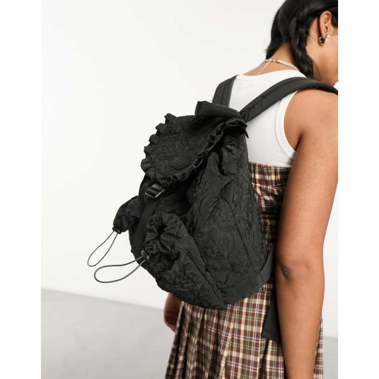 Damson Madder stitch quilted backpack in black | ASOS