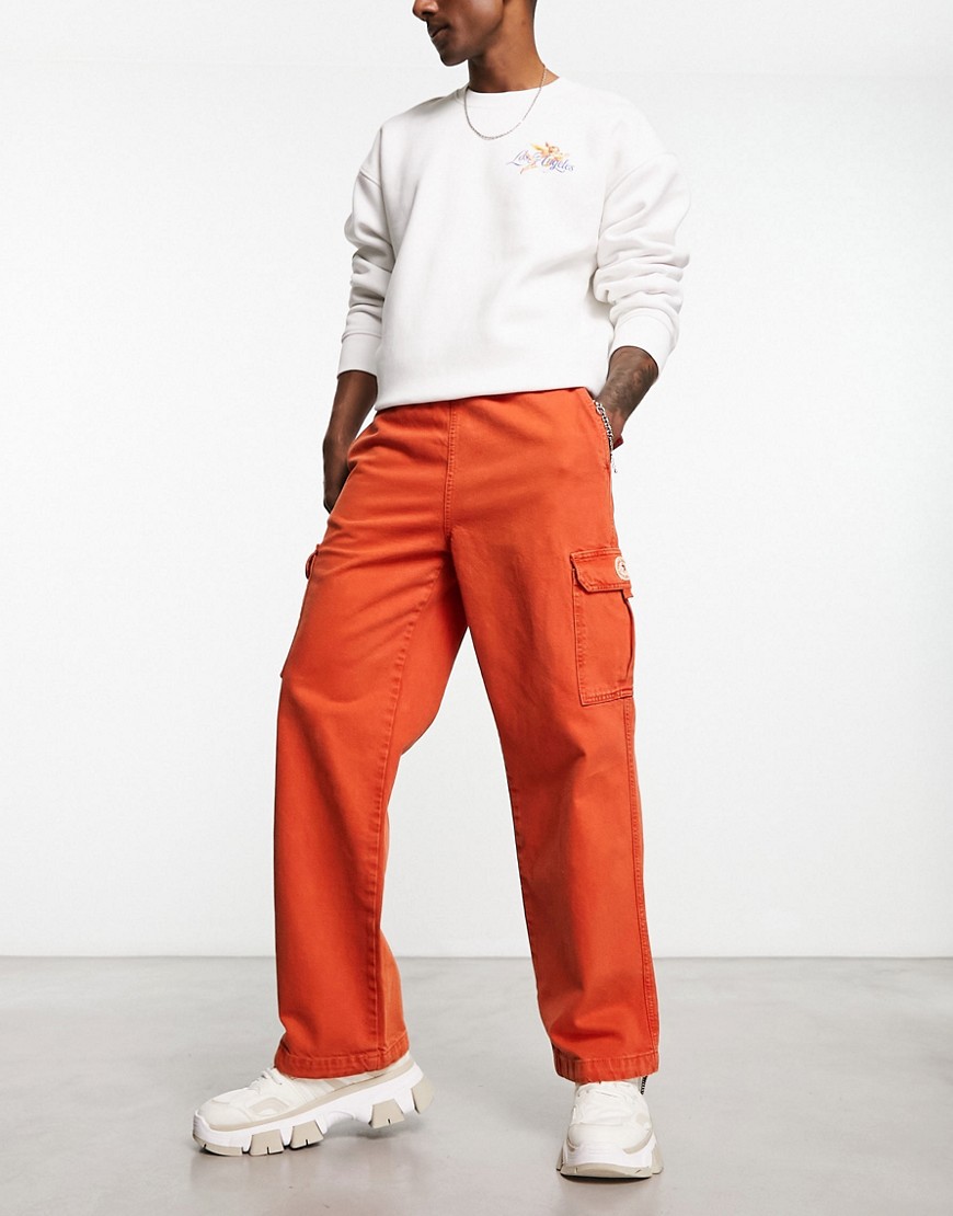 Damson Madder worker chino trousers in washed red