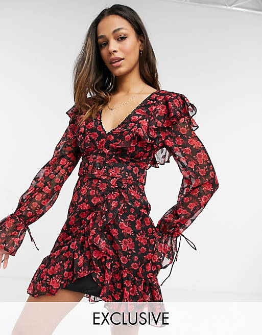 Dark Pink belted frill detail mini dress in black and red rose print