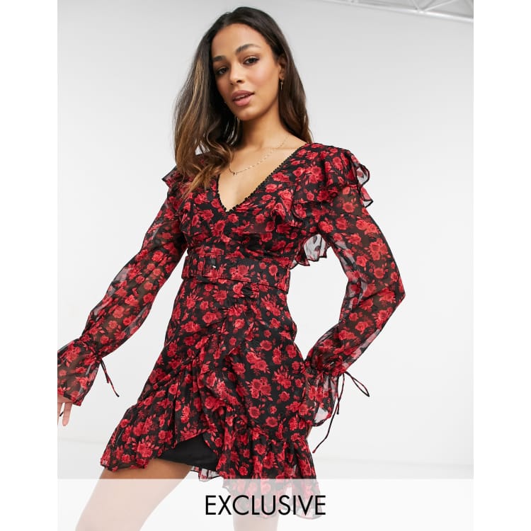 Dark Pink belted frill detail mini dress in black and red rose print