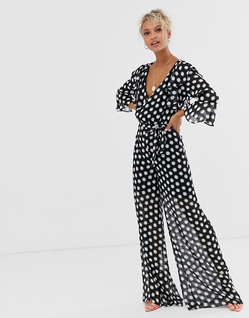 Dark Pink plunge front jumpsuit in black and white spot print