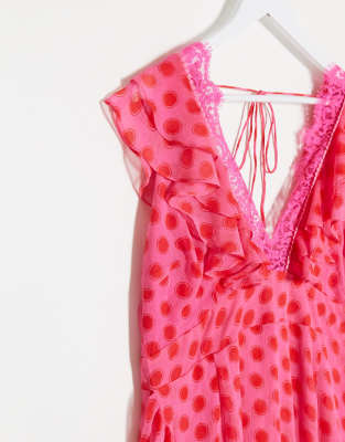 pink dress with red polka dots