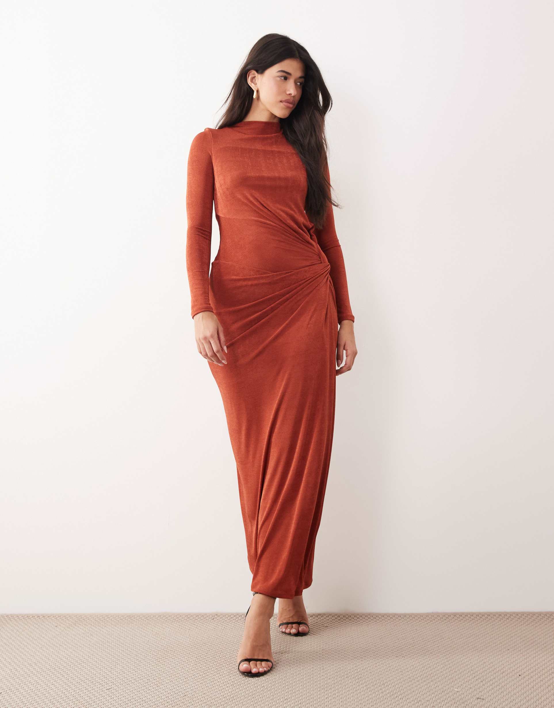 daska stretch long sleeve high neck twist maxi dress in rust