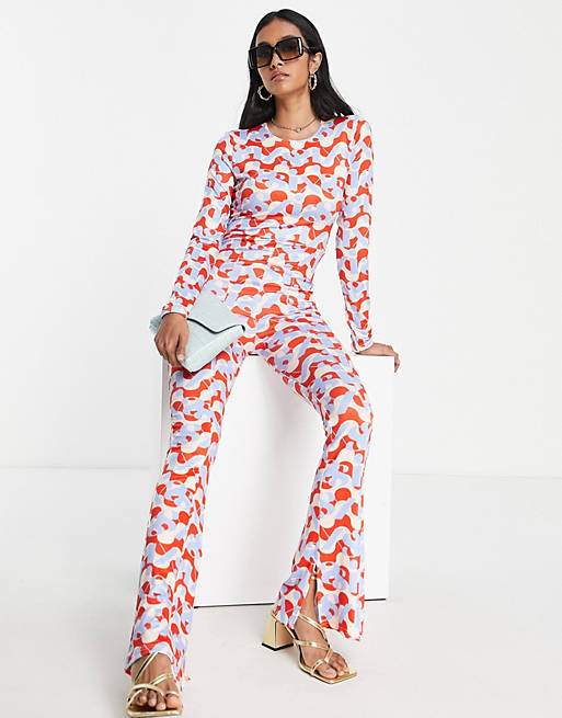 Day 6 long sleeve jumpsuit in red geo print