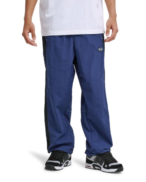DC Shoes Flow down tracksuit bottoms in estate blue - view 1
