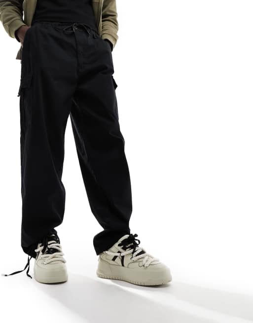 Denim Project elastic detailed utility pants in black 