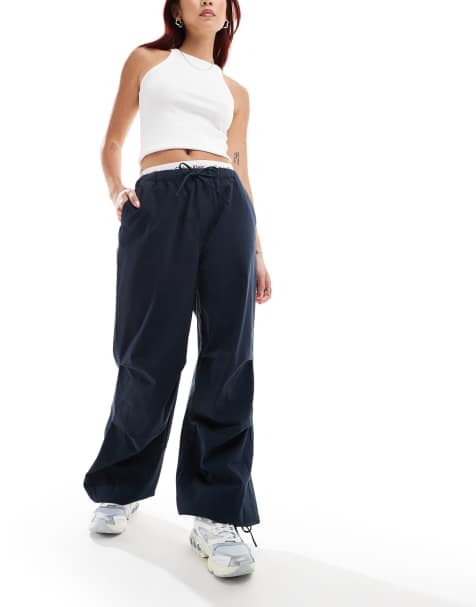 Denim Project loose fit parachute trousers in dark blue - view 1
