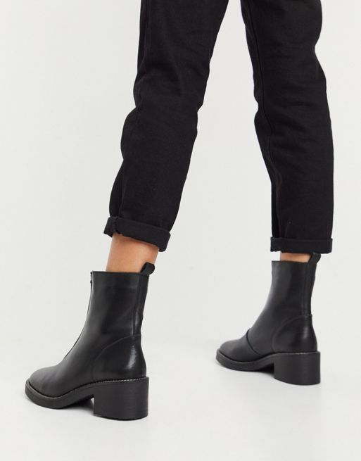 Depp chunky center zip boots in black leather