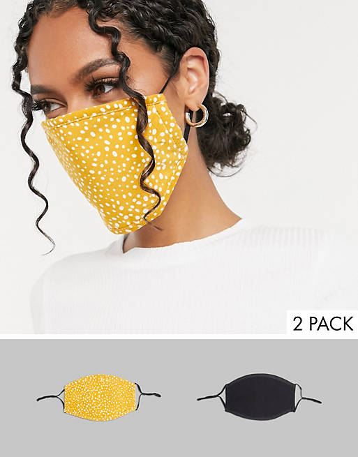 DesignB London 2 pack face covering with adjustable straps in black and ochre polka dot print