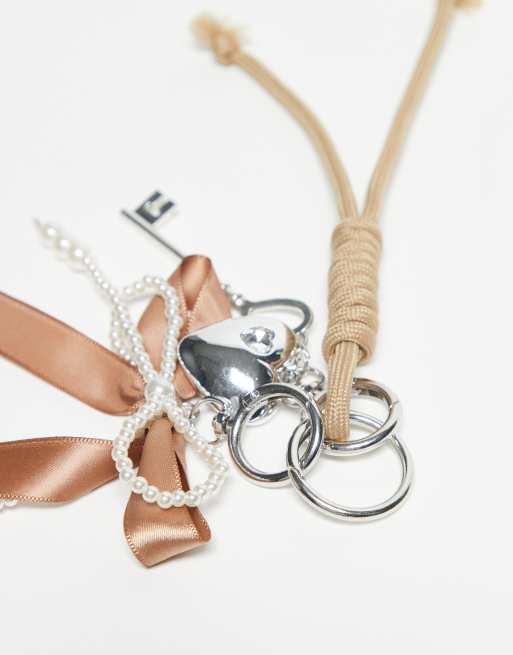 DesignB London - Bijou de sac avec cordon élastique et charm nœud à perles - Marron, 3 de 3