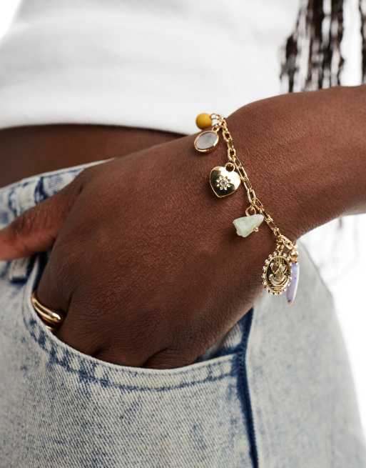DesignB London - Bracciale color oro con charm multipli