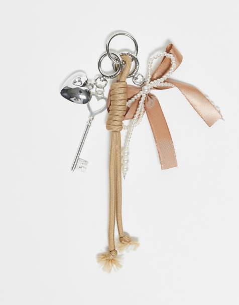 DesignB London bungee cord and faux-pearl bow bag charm in brown - view 1