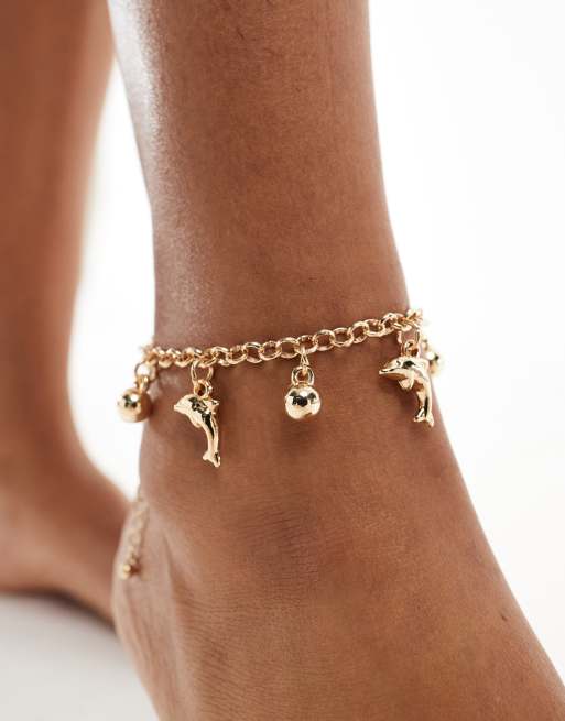 DesignB London - Cavigliera color oro con charm a forma di delfini 