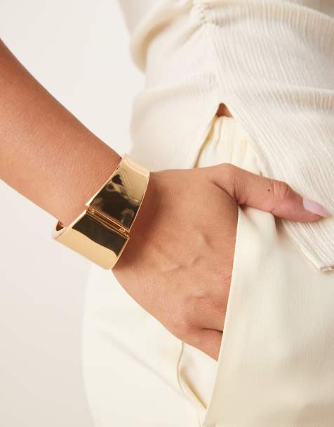 DesignB London chunky metal bangle bracelet in gold - view 1