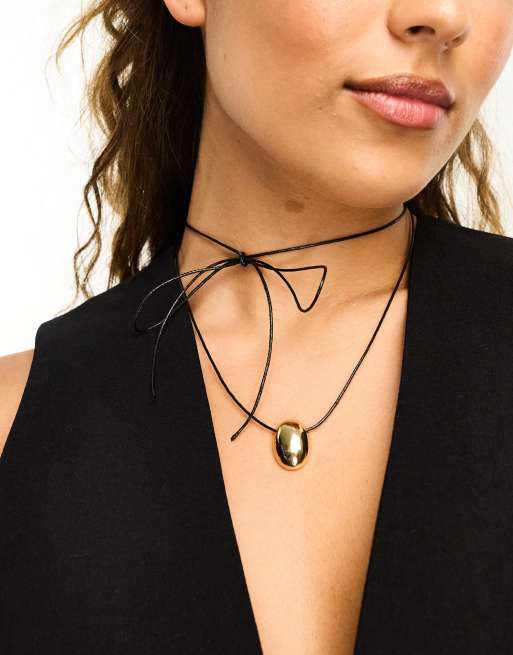 DesignB London - Collana a corda con ciondolo bombato color oro