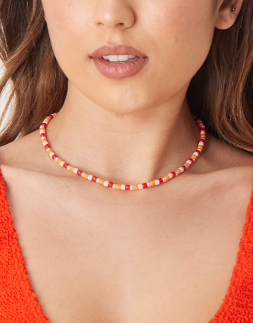 DesignB London - Collana arancione e rosa con perline multicolore