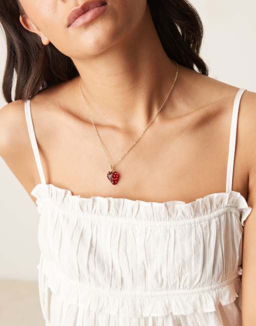 DesignB London - Collana color oro con ciondolo a forma di fragola