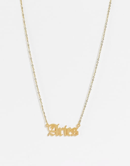 DesignB London - Collana in acciaio inossidabile color oro con scritta zodiacale Aries 
