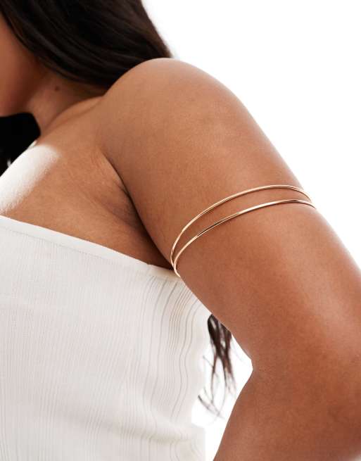 DesignB London Curve - Enkel armring i guldfarve 