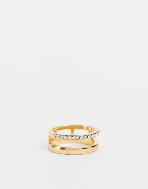 DesignB London Curve – Guldfärgad stapelbar ring i pavédesign