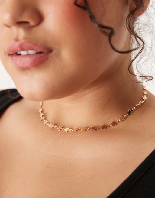 DesignB London Curve – Naszyjnik typu choker z małymi gwiazdkami w złotym kolorze