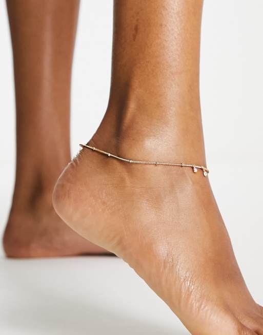 DesignB London - Enkelbandje met kristallen hangertjes in goudkleur 