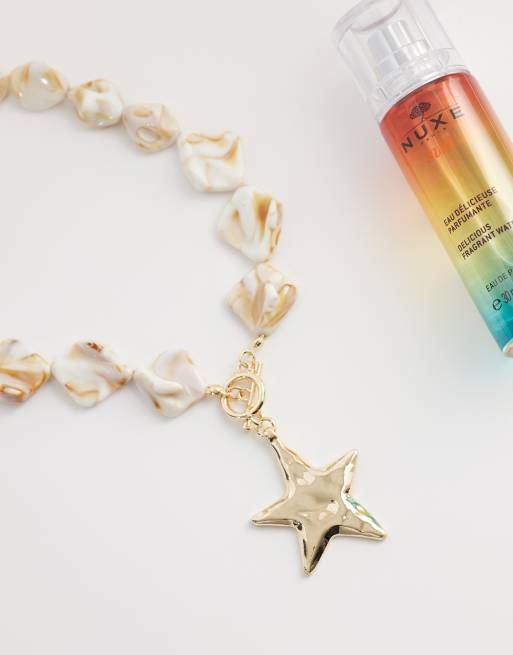 DesignB London faux shell starfish pendant necklace in gold, 2 of 4