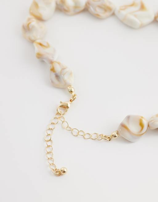 DesignB London faux shell starfish pendant necklace in gold, 3 of 4