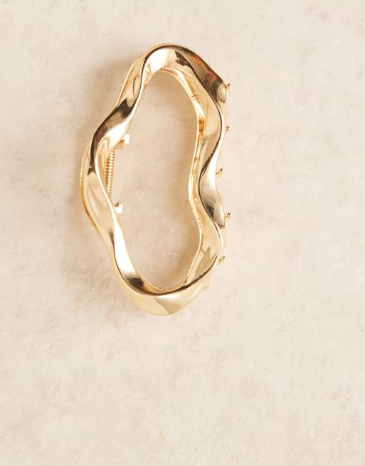 DesignB London – Guldfärgad hårklämma i metall med smält design, 2 av 3
