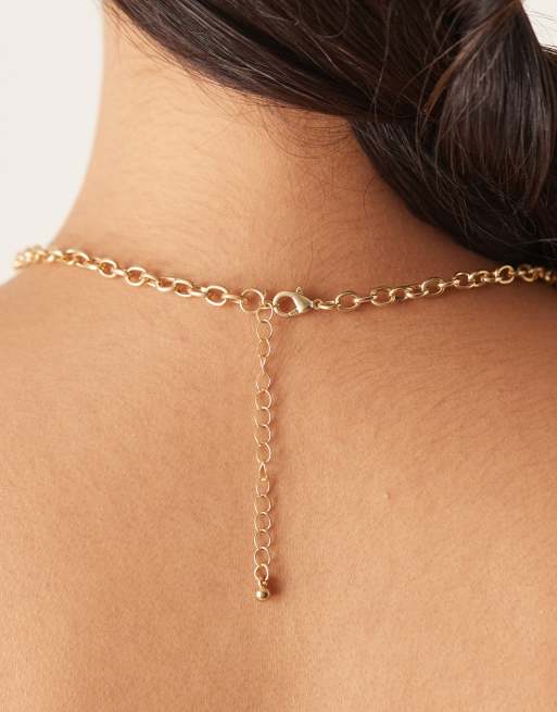 DesignB London – Guldfärgat halsband med stjärnhängen, 3 av 3