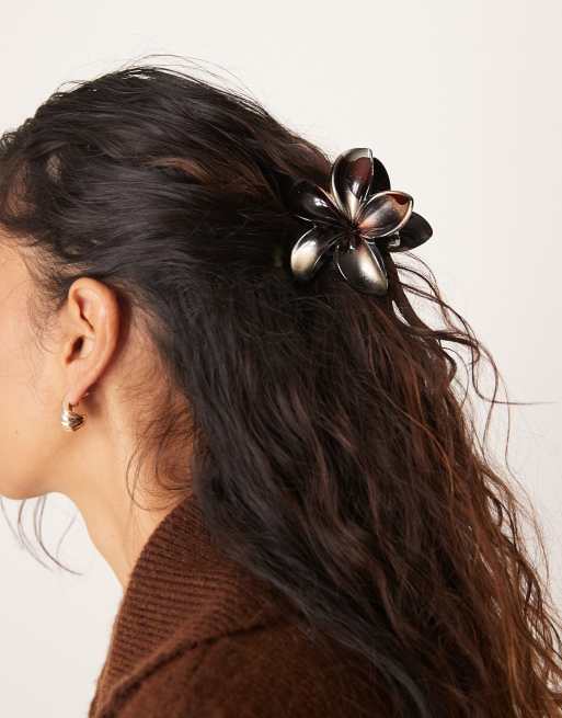 DesignB London - Haarklem met Hawaiiaanse bloemvorm in zwart met metallic effect