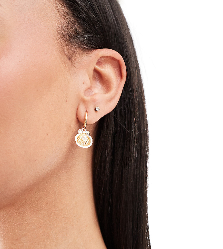 DesignB London huggie hoop earrings with shell pearl charm in gold