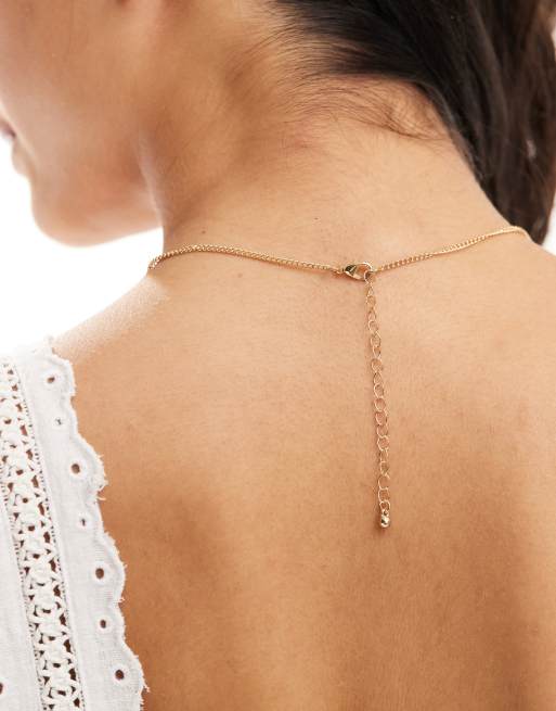 DesignB London - Ketting met dolfijn- en kristalhanger in goud , 4 van 4