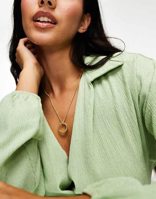 DesignB London - Ketting met gedraaid hangertje in goud