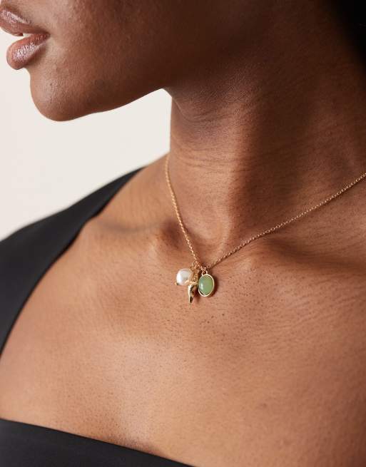 DesignB London - Ketting met meerdere hangertjes in goud