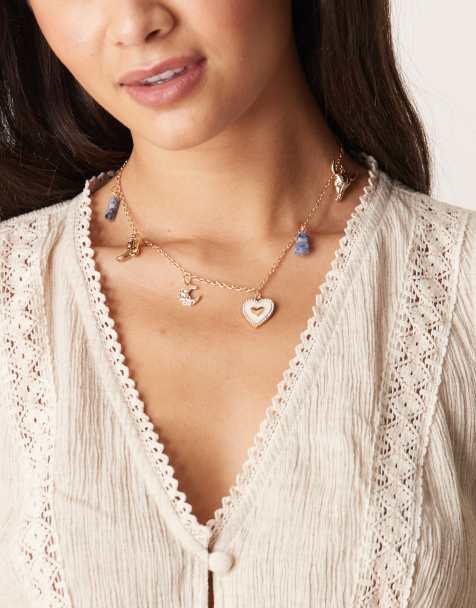 DesignB London - Ketting met meerdere western bedeltjes in goud - view 1