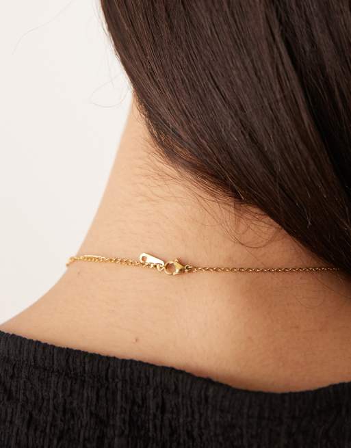 DesignB London - Ketting met versierd bol E-initiaal met versiering in goud, 2 van 4