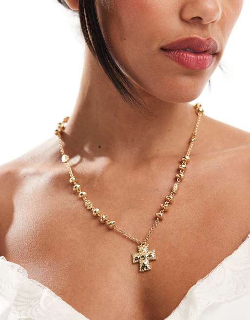 DesignB London - Lange ketting met kralen en kruishangertje in goud 