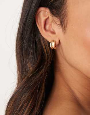 layered hoop earrings in gold