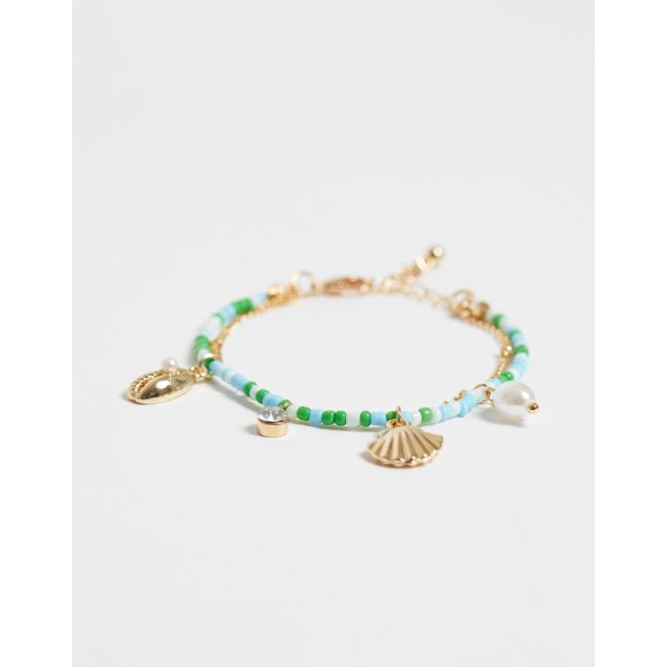 DesignB London layered sea charm beaded bracelet in blue and gold | ASOS