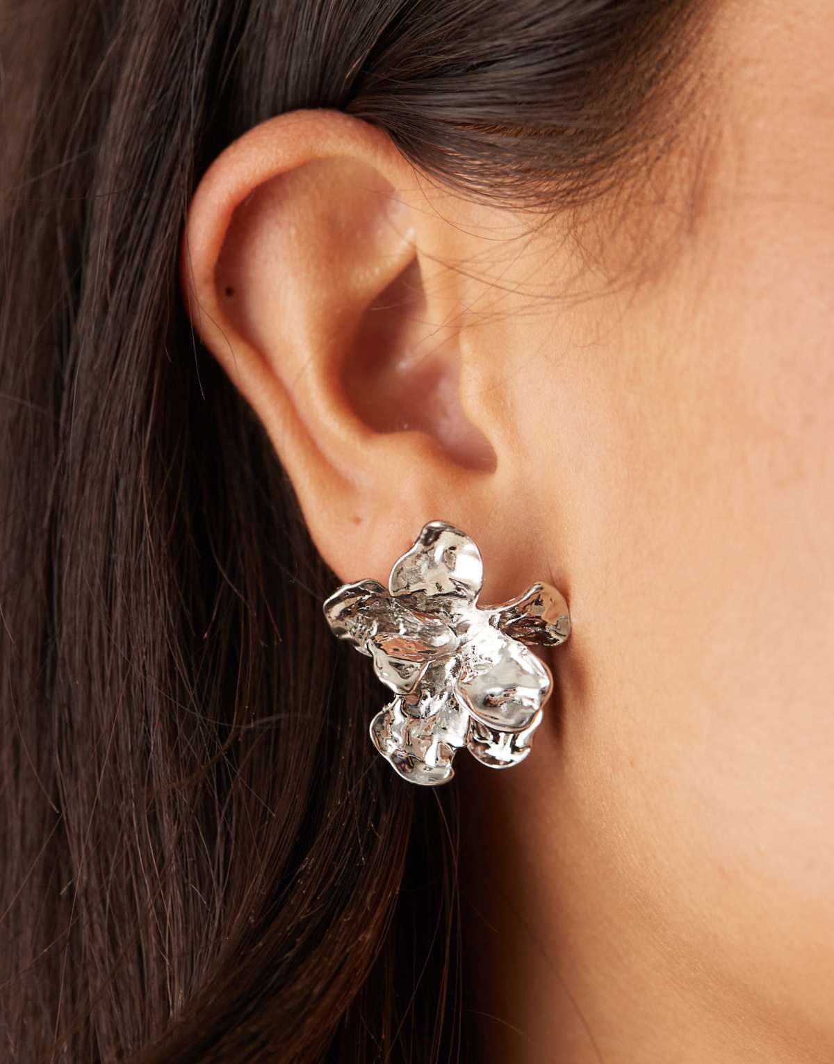DesignB London molten flower stud earrings in silver