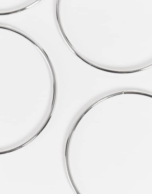 DesignB London - Multipakke med 4 sølvfarvede armbånd til at stable, 3 af 4