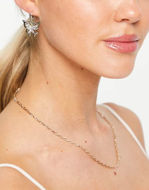 DesignB London - Orecchini pendenti color oro con farfalla con strass, 3 di 4